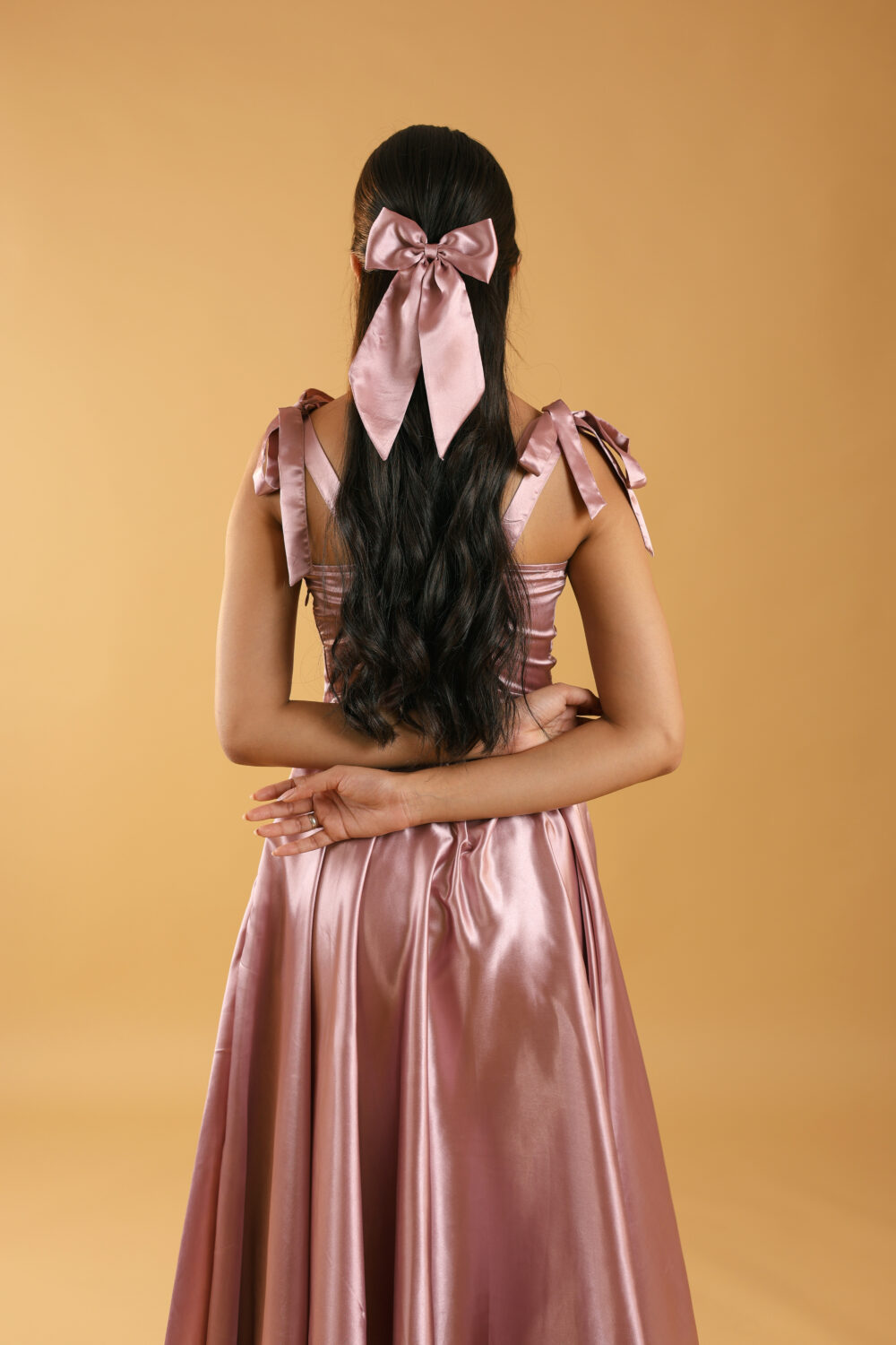 Dusty Rose satin midi dress with flared hem and tie-up shoulder straps, designed for party wear and college events