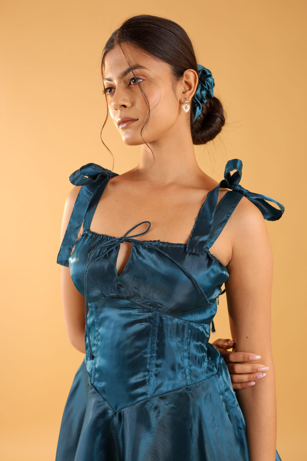 Short teal one piece dress for girls with 4-meter flair, perfect for party nights and freshers events.