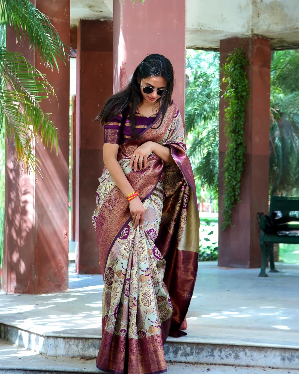 Kanjivaram silk saree in maroon and gold for women, ideal for wedding, farewell, or festive occasions