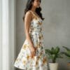 Women’s white floral A-line summer dress with yellow flower print – front and back view