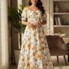 Women’s white floral maxi dress with yellow flower print and puff sleeves